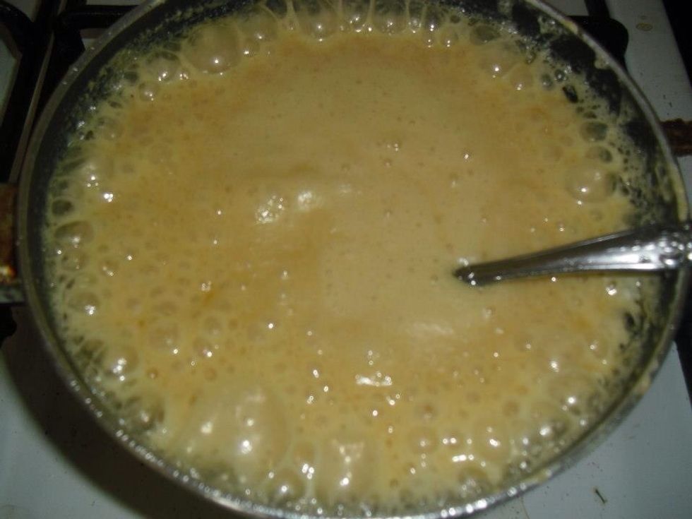 Warm the milk until boiling.