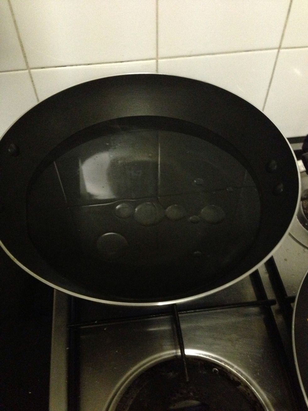 Warm the water n put a little bit if oil