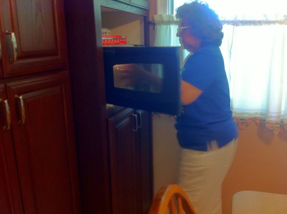 Warm up about a pint full of water.