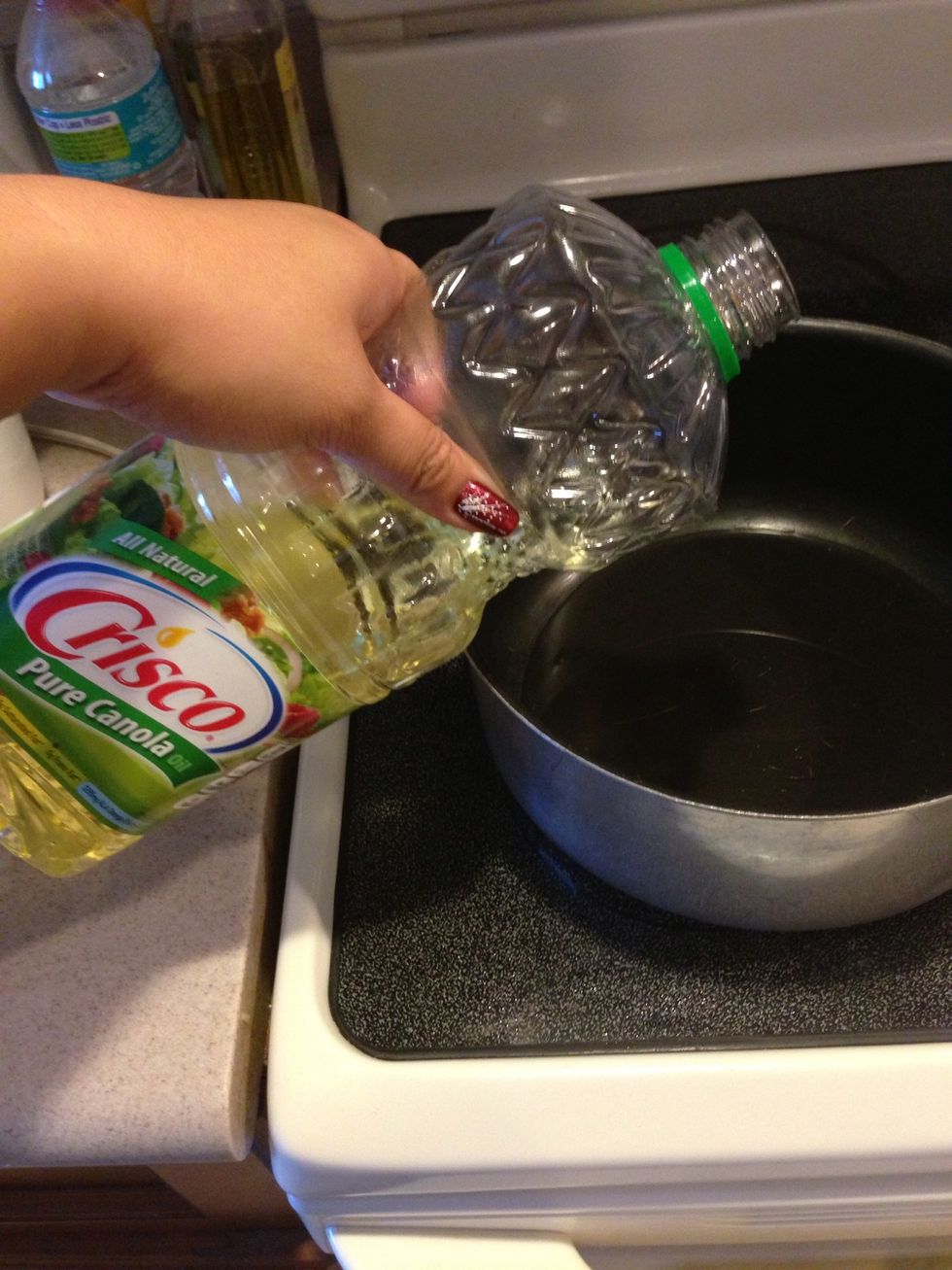 Warm up oil in large pot...