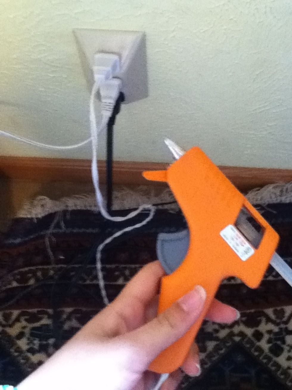 Warm up your hot glue gun and get your bottle top and rock ready