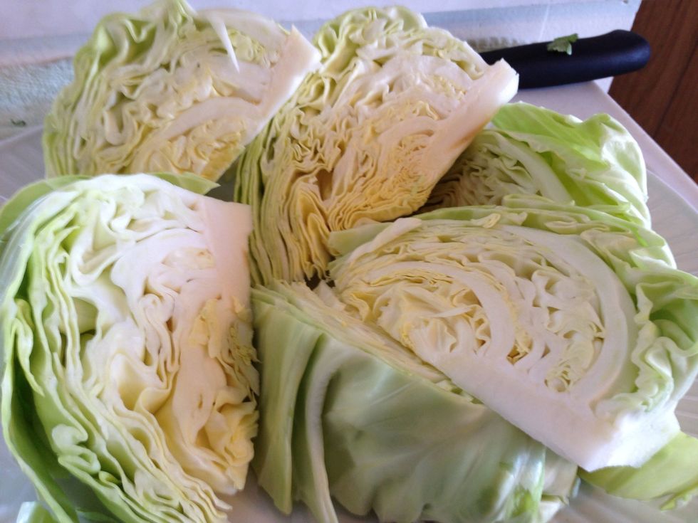 Wash and cut cabbage in wedges