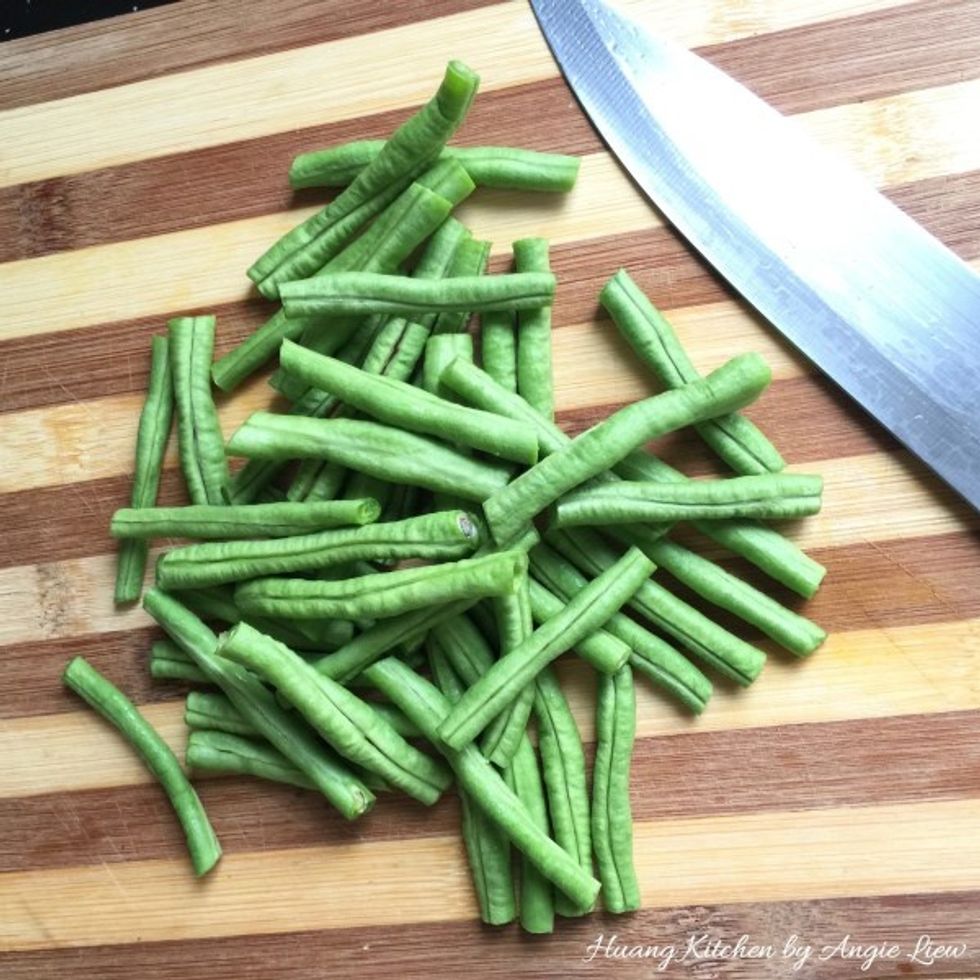 Wash and cut long beans into long strips.