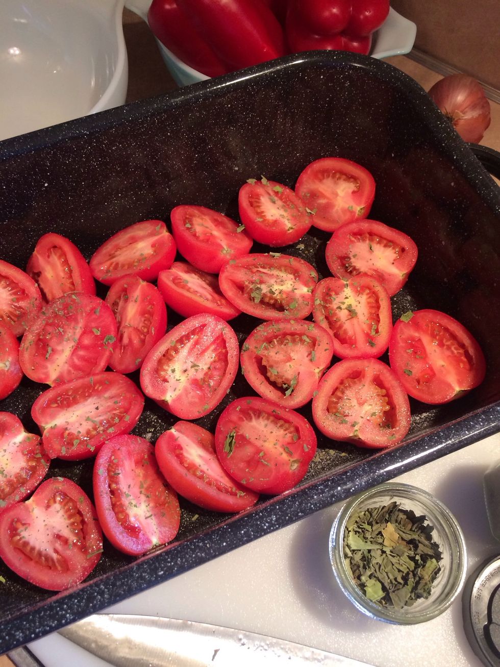 Wash and cut plum tomatoes in half and place into a well oiled roasting pan. Sprinkle with salt, pepper, granulated garlic and fresh dried basil.