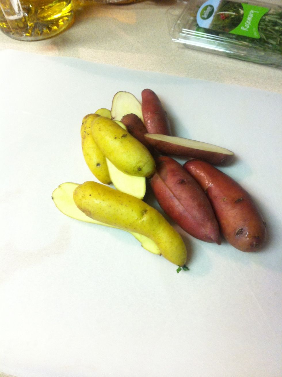 Wash and cut your potatoes in half lengthwise.