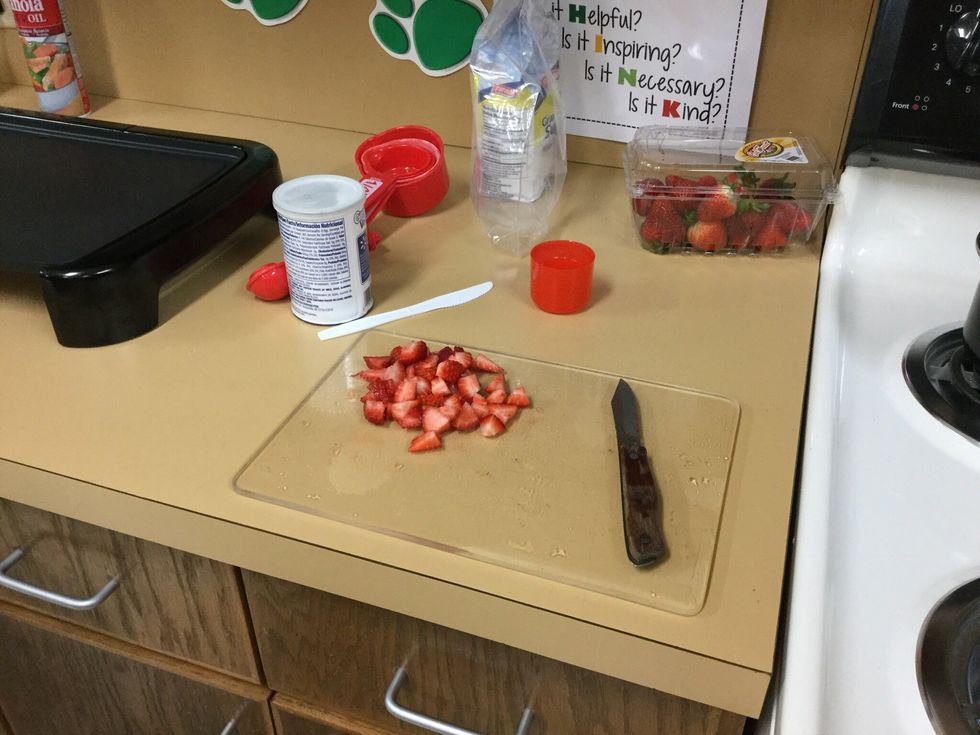 Wash and cut your strawberries into small pieces.