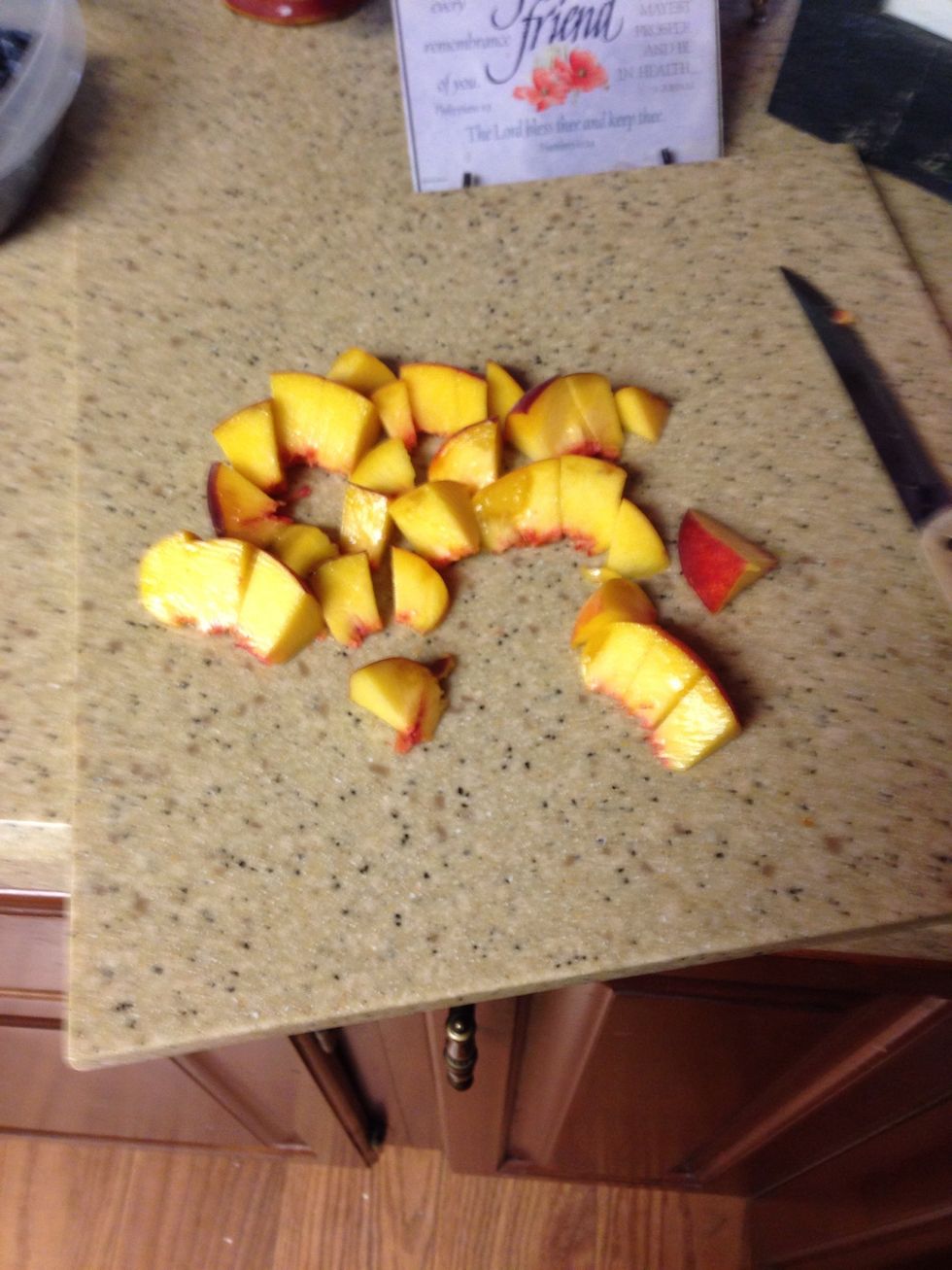 Wash and dice peach. It's up to you if you peel the skin off the peach or not.