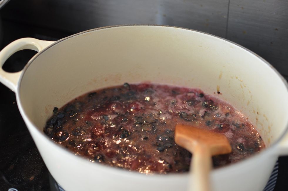 Wash and drain the blueberries, Crush them with a potato masher. Stir in the pectin, lemon juice and water. Bring them to boil, stirring occasionally.