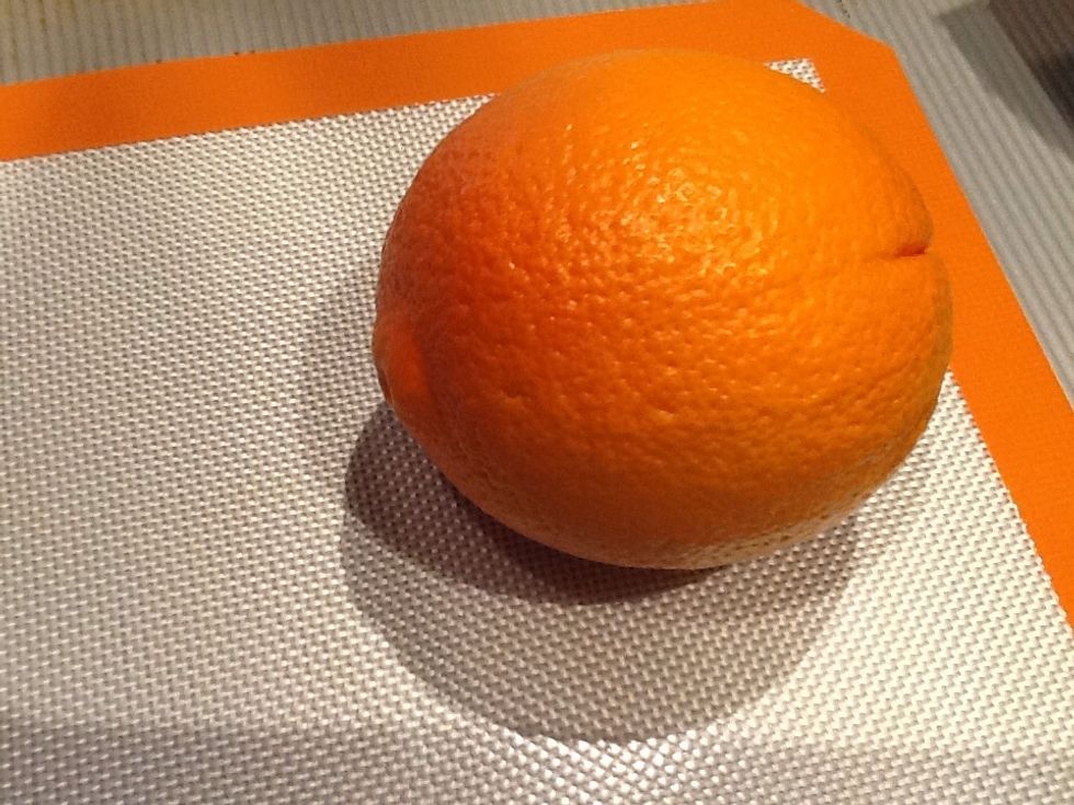 Wash and dry the orange.