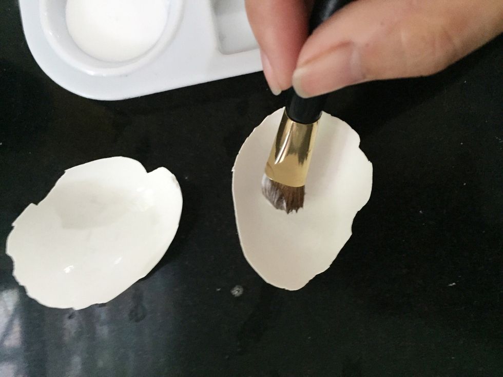 wash and dry, then cover the inside with glue. make sure to cover the entire surface.