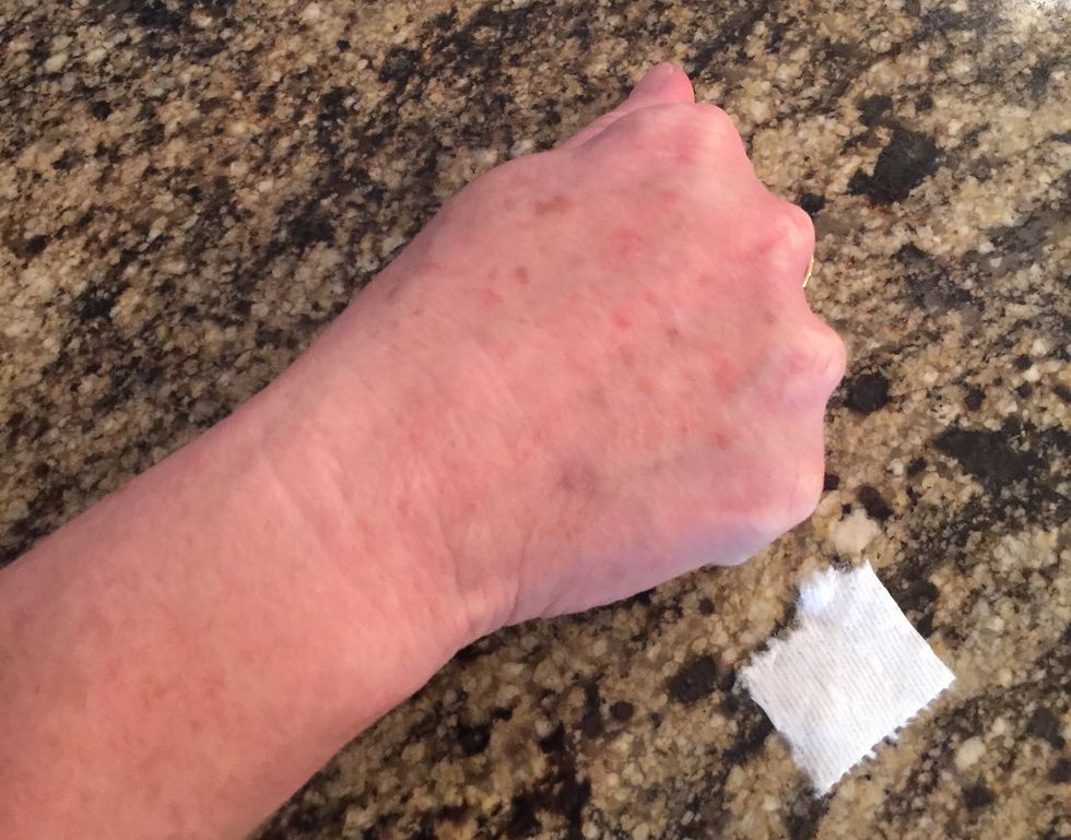 Wash and dry your hand, or body part, that you are doing the make-up on. Tear 3 pieces of toilet paper in the size of the wound you want.