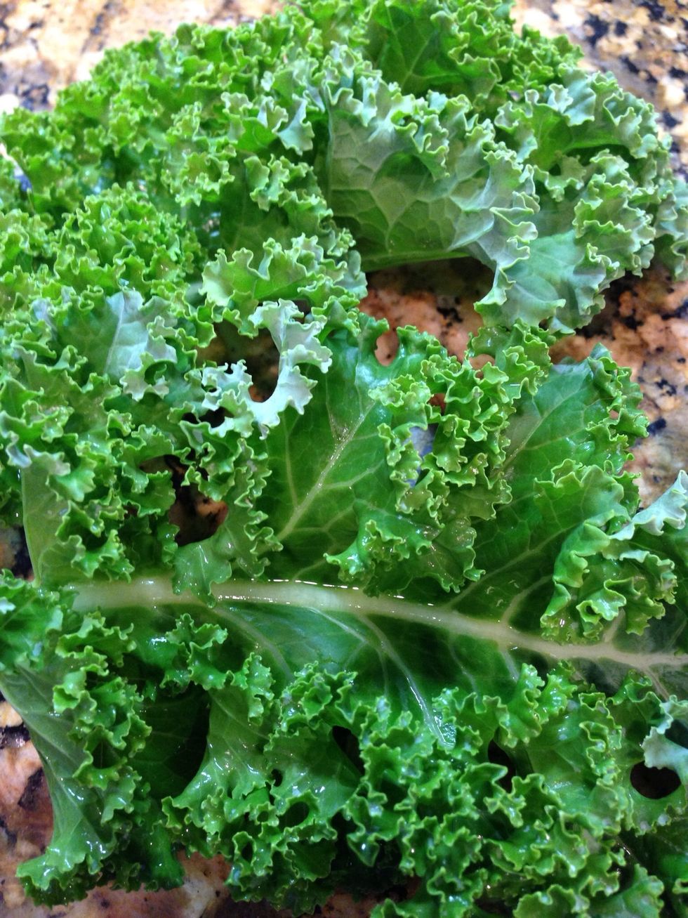 Wash and dry your kale completely.
