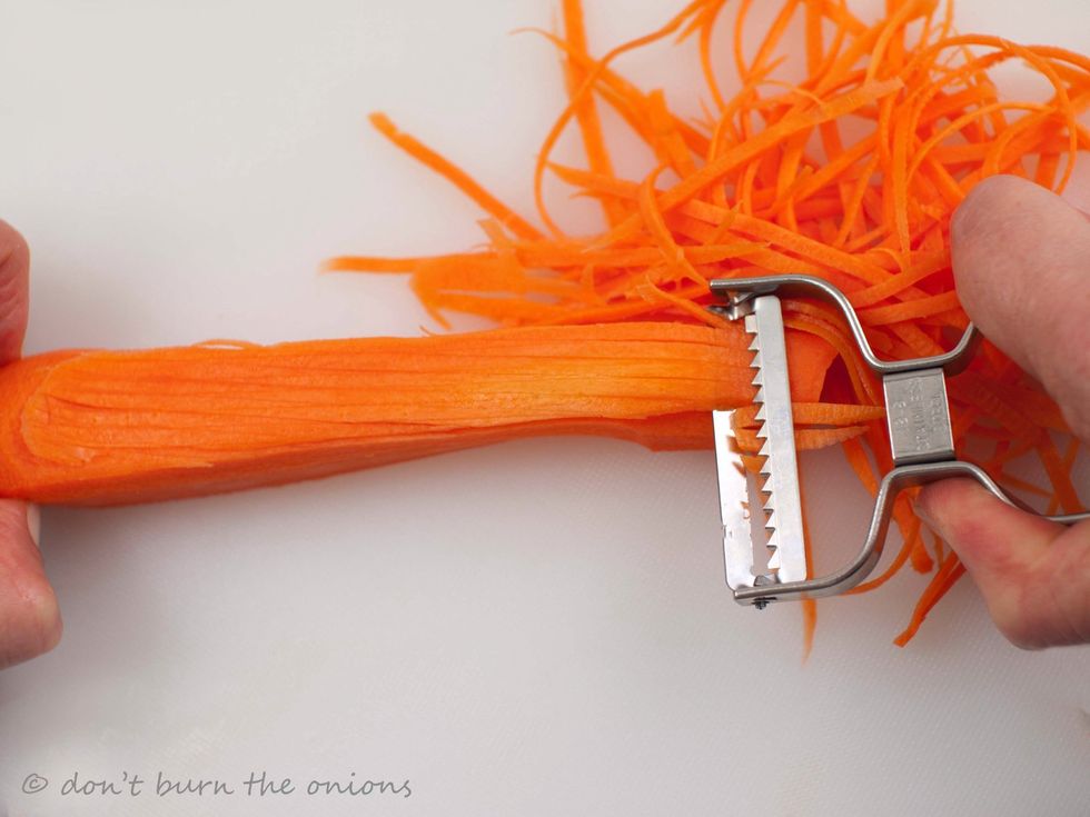 Wash and peel carrot. I used this serrated slicer which is very quick and makes lovely thin strands in seconds.