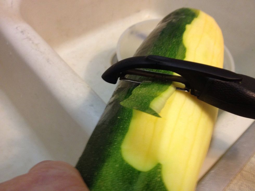 Wash and peel the zucchini.