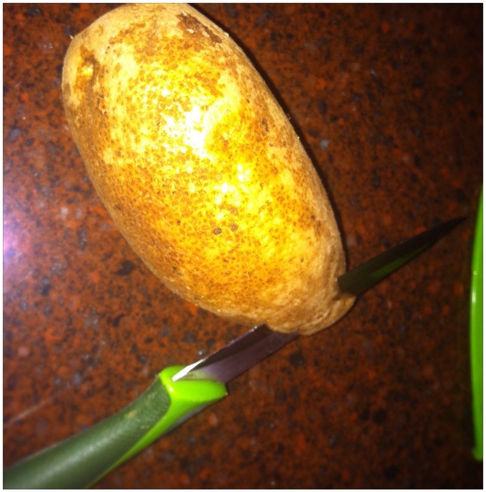 Wash and peel your tator. This is mainly for the look of it. You'll see what I'm sayin'.