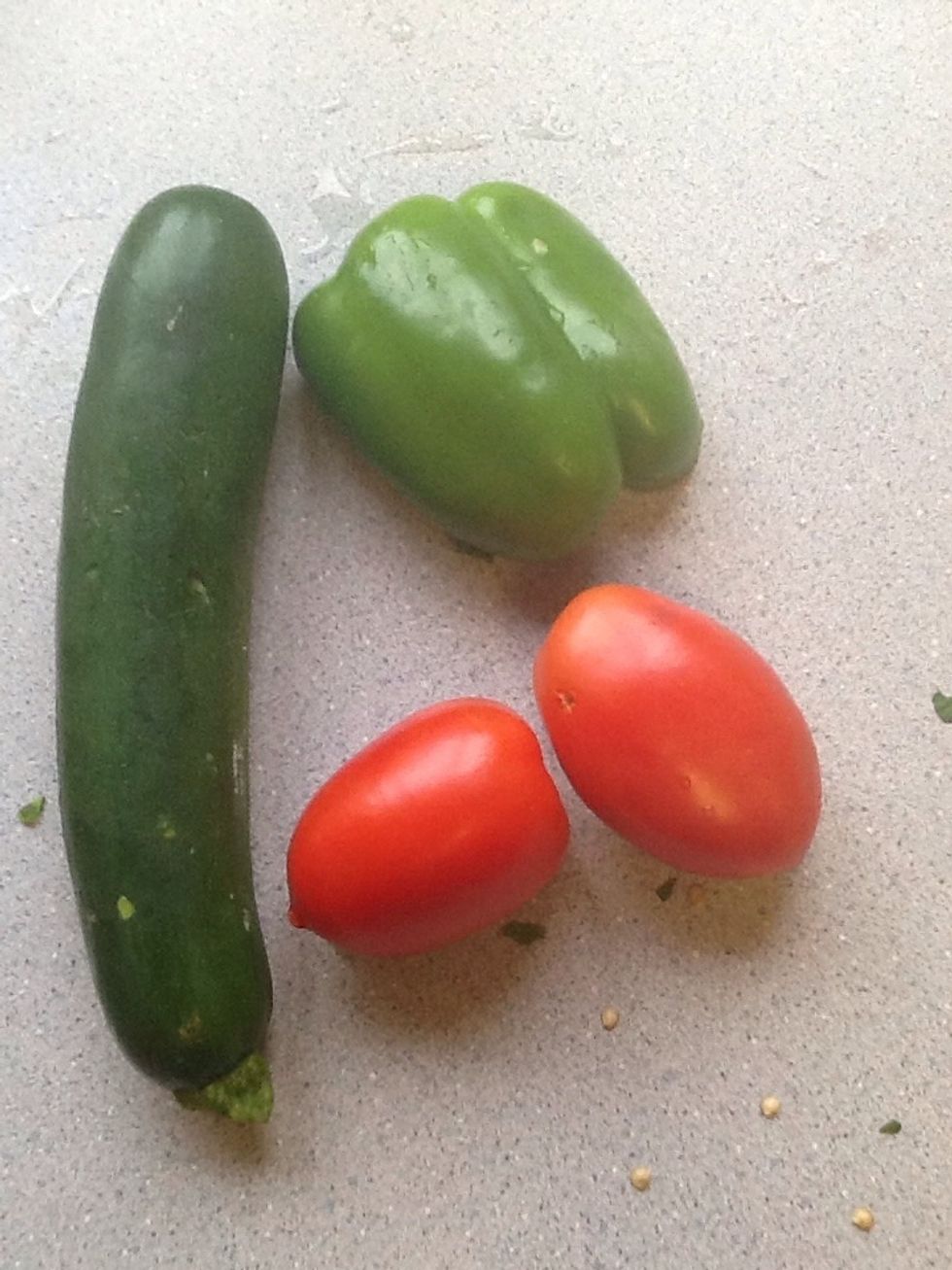 Wash and prepare vegetables.