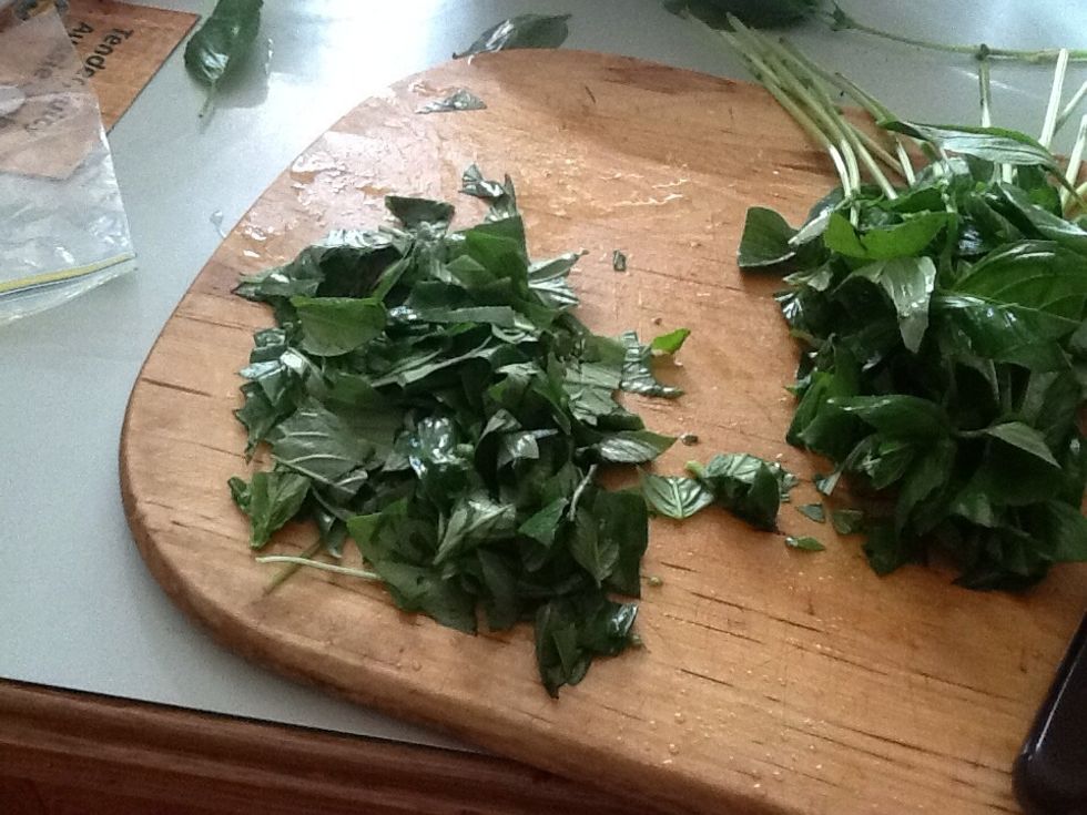 Wash basil and cut it up