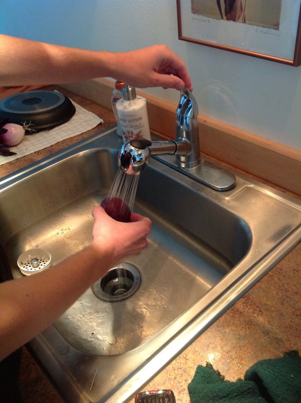Wash basil, zucchini, golden squash, and tomatoes