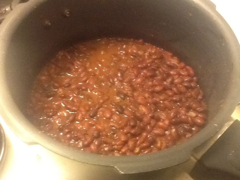 Wash black beans really well and then pour it in a vessel, let it cook on medium flame add taco seasoning and salt. keep mixing-----in 10minutes it will be ready