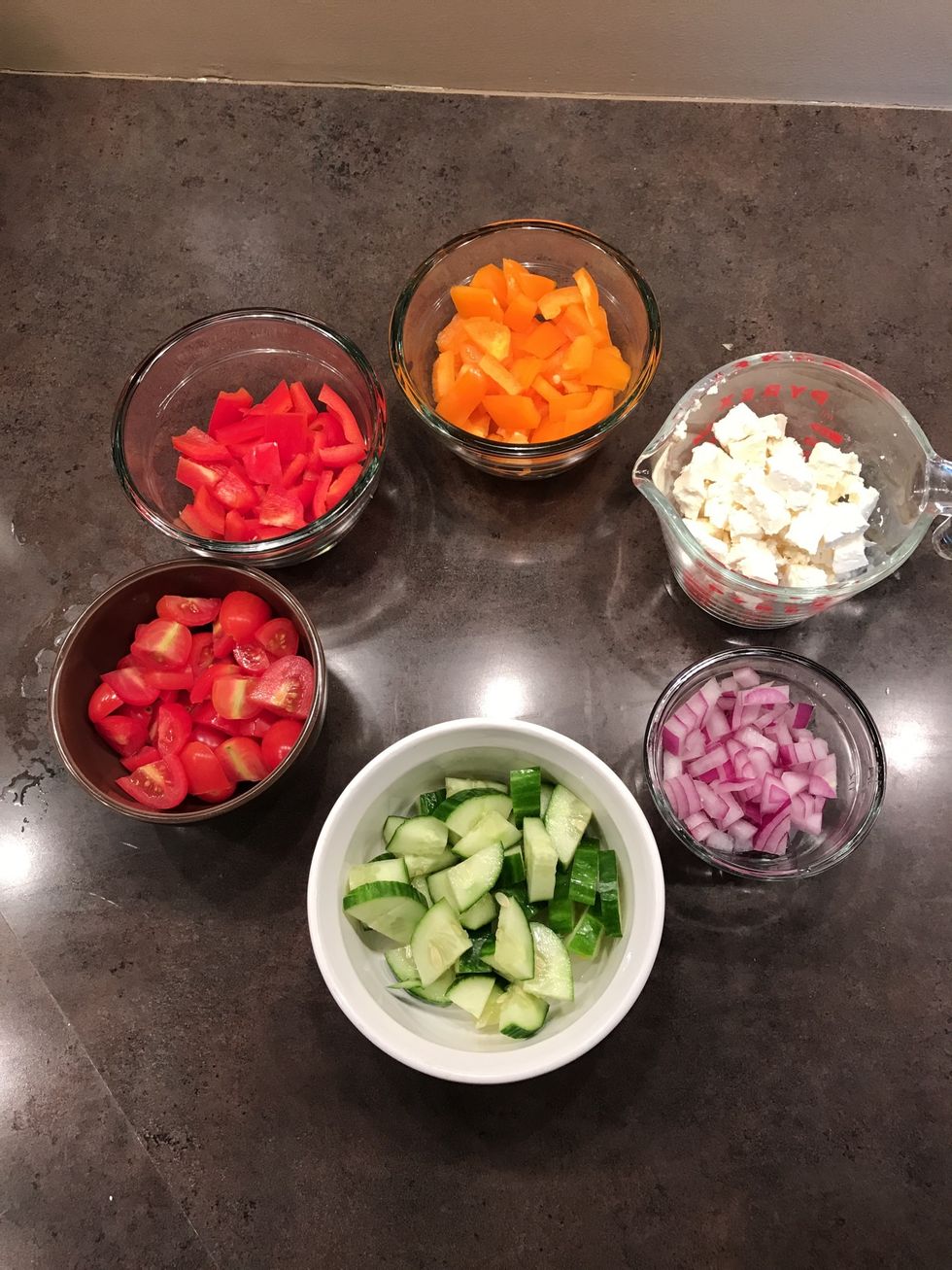 Wash, cut, and prepare all ingredients for the quinoa
