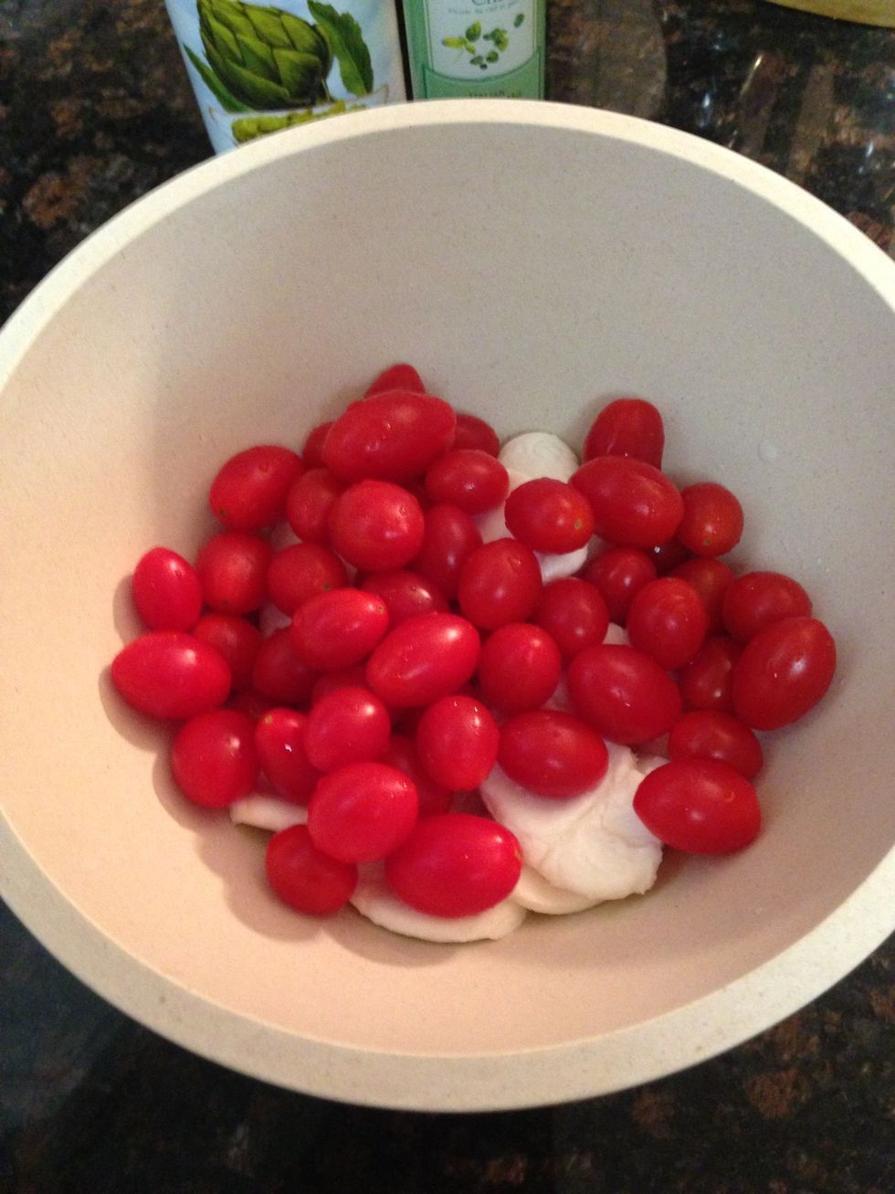 Wash & drain grape tomatoes and add to salad bowl
