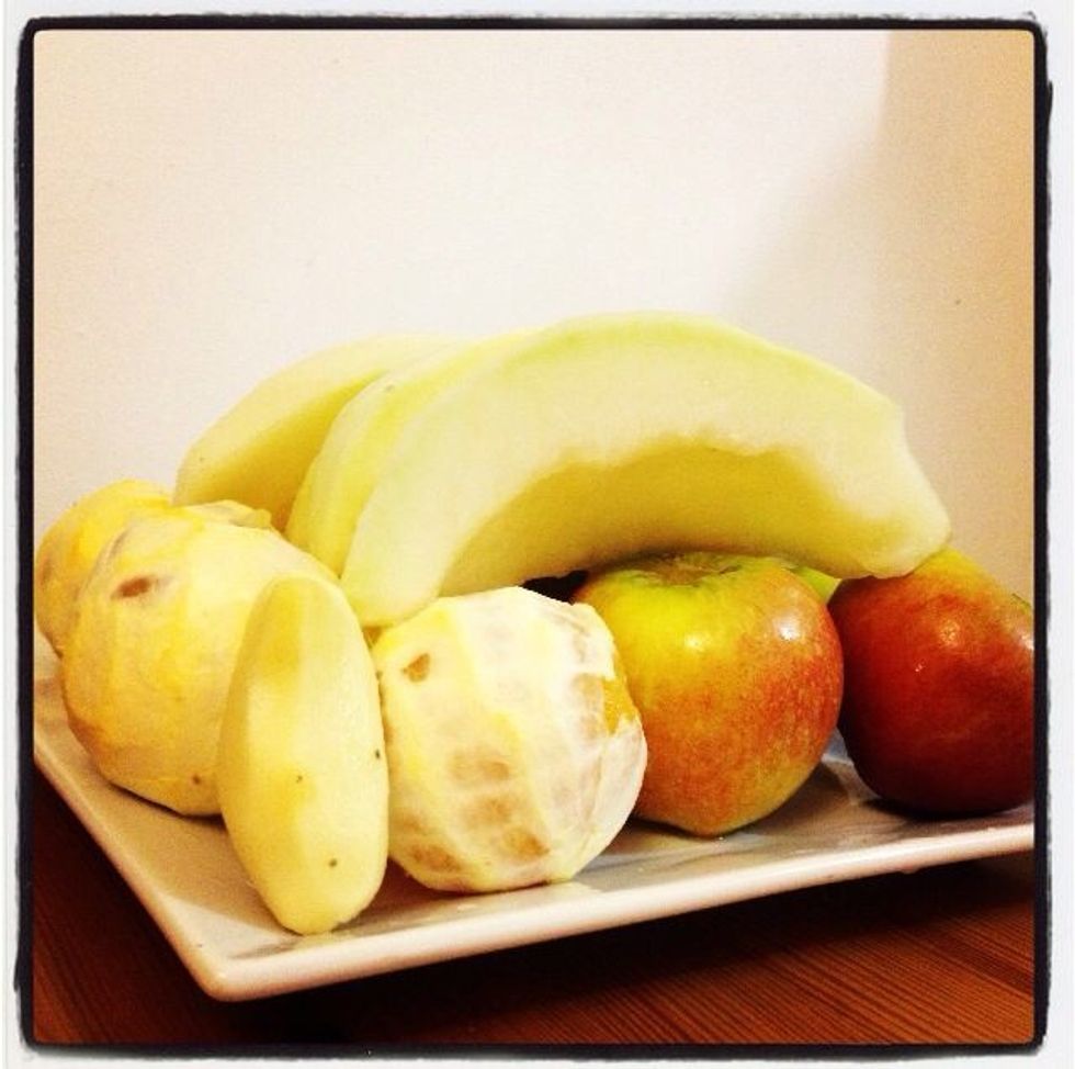 Wash fruits, peel melon & oranges, remove ginger skin and core apples to remove seeds (can keep skin on).