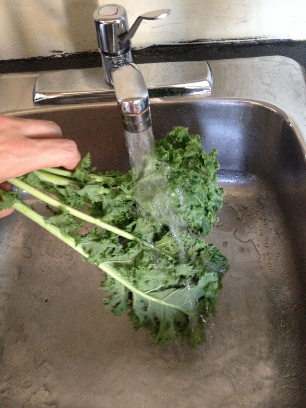 Wash kale carefully. Then pat dry.