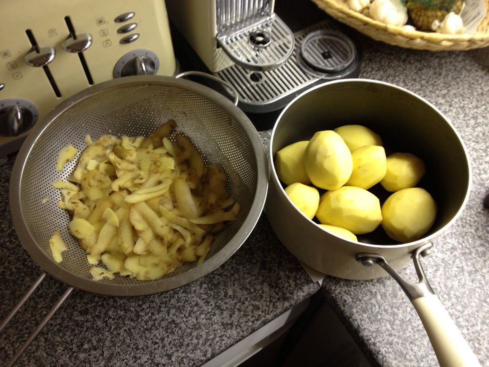 Wash, peel and cut your potatoes in half. I like to do this step before even putting the meat on. More convenient during the cooking process :-)
