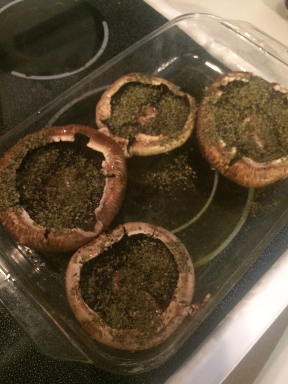 Wash portabella caps, add salt pepper and basil