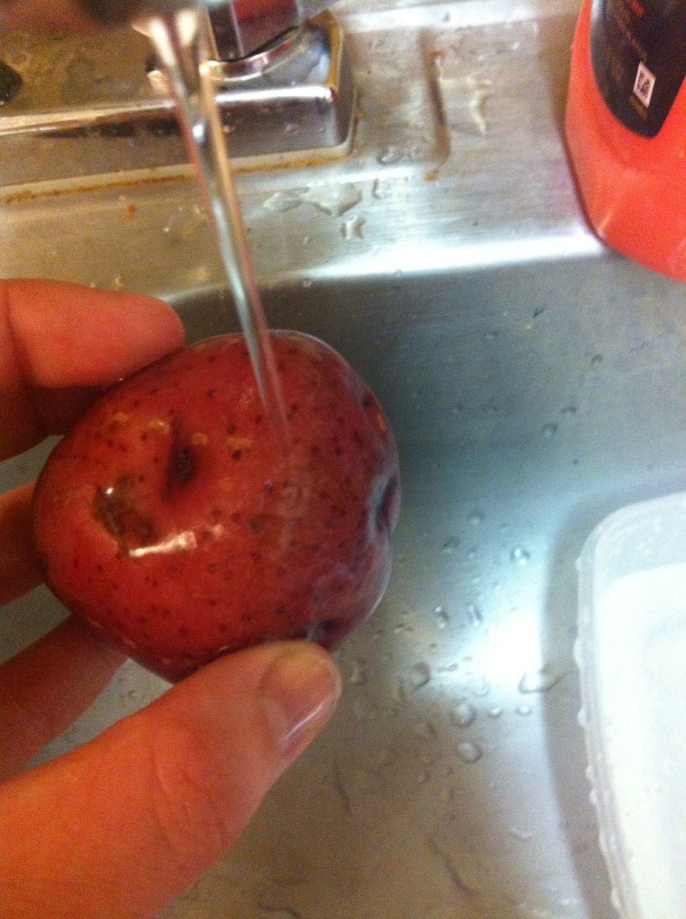 Wash potato with cold water