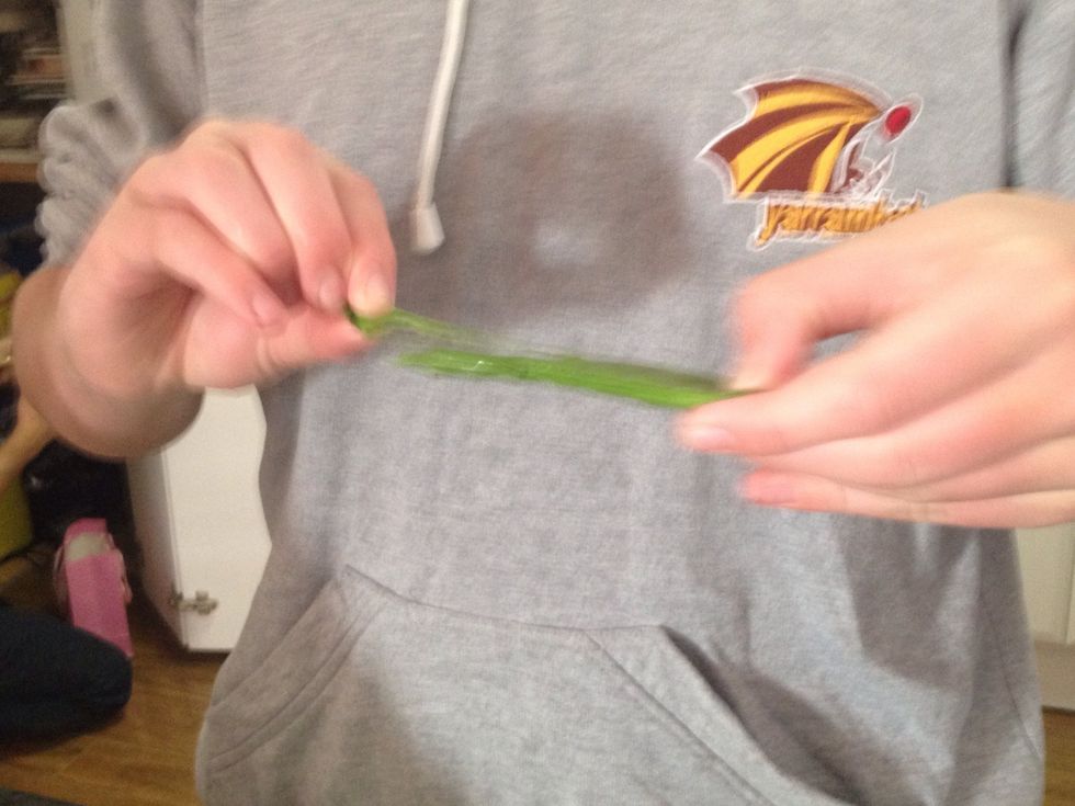Wash snow peas,snap the ends and pull string off. Then place in bowl.