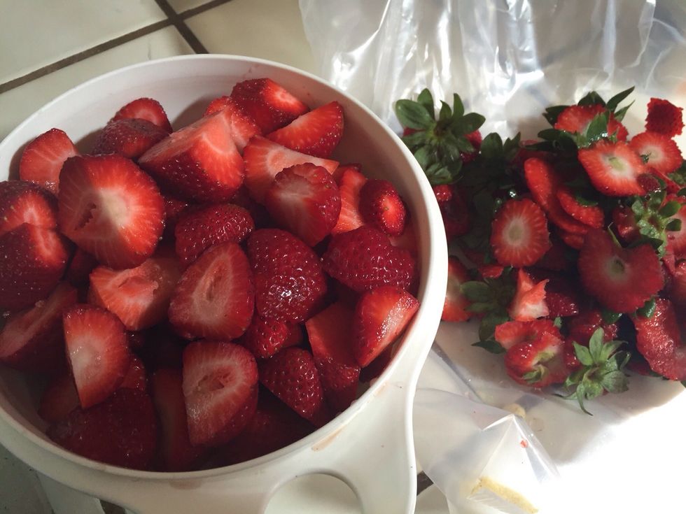 Wash strawberries. Cut off stem and any bad spots. Cut strawberries in half.