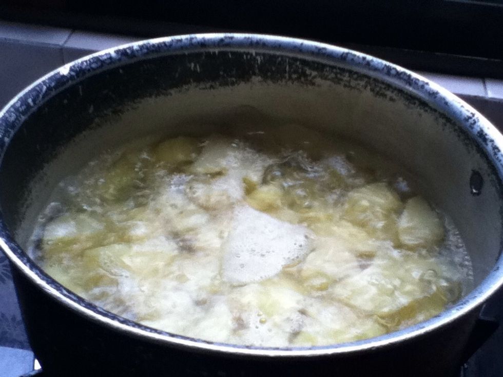 Wash the chunks of potatoes to remove the starch and boil them until soften.