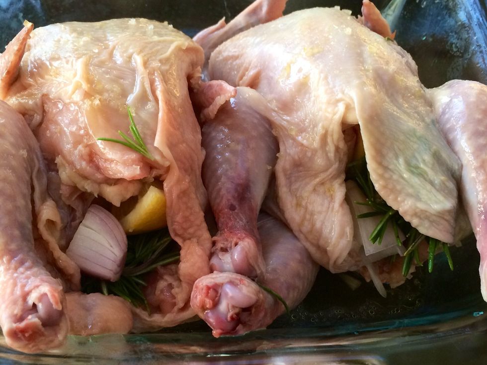 Wash the cornish hens well. Pat dry then massage generously with olive oil, drizzle with salt and freshly ground pepper. Set aside in a dish.