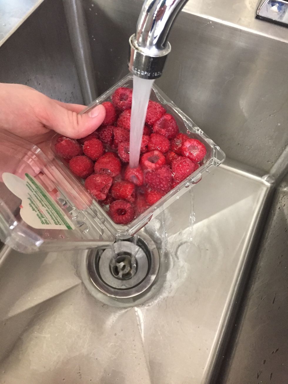 Wash the raspberries for garnish.