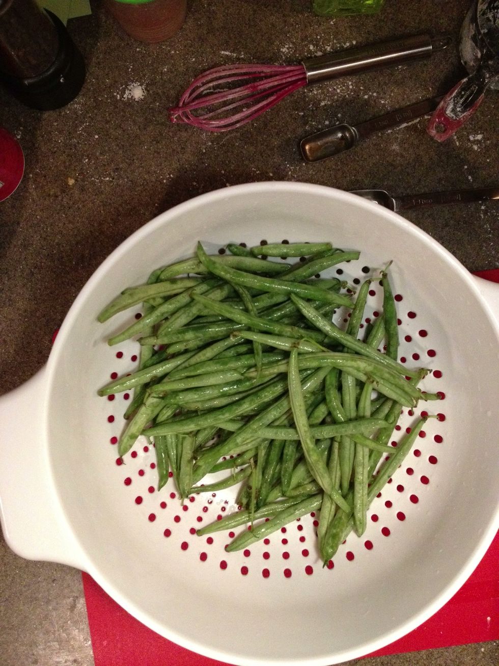 Wash, then snap the ends off one pound of fresh green beans.