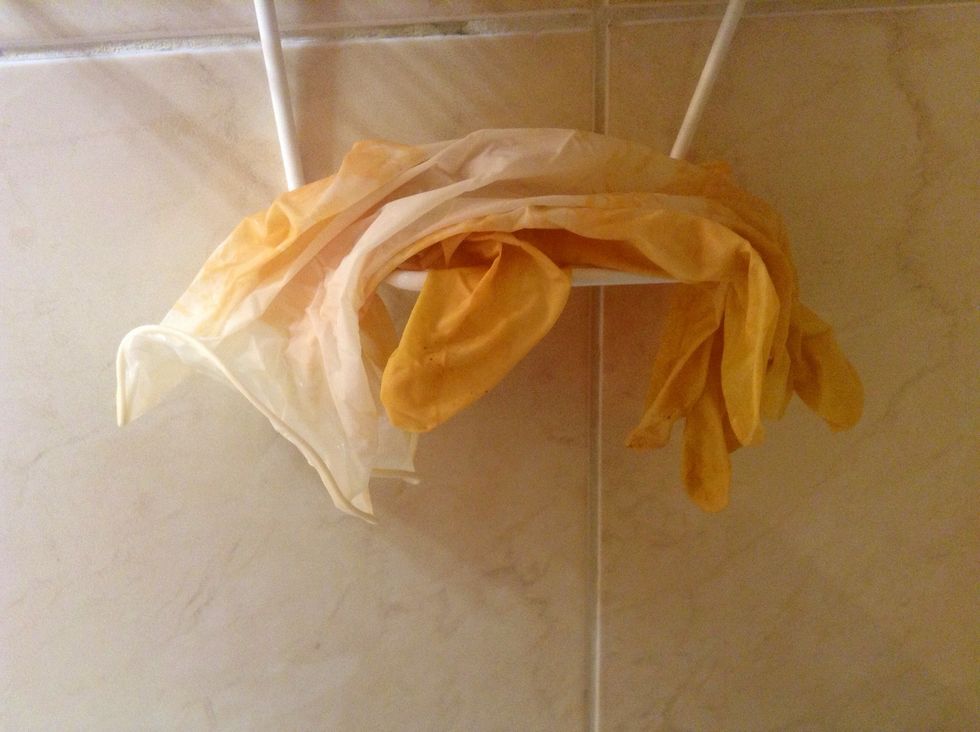 Wash up those (now golden) gloves and leave them handy for later when you will be washing out the henna.