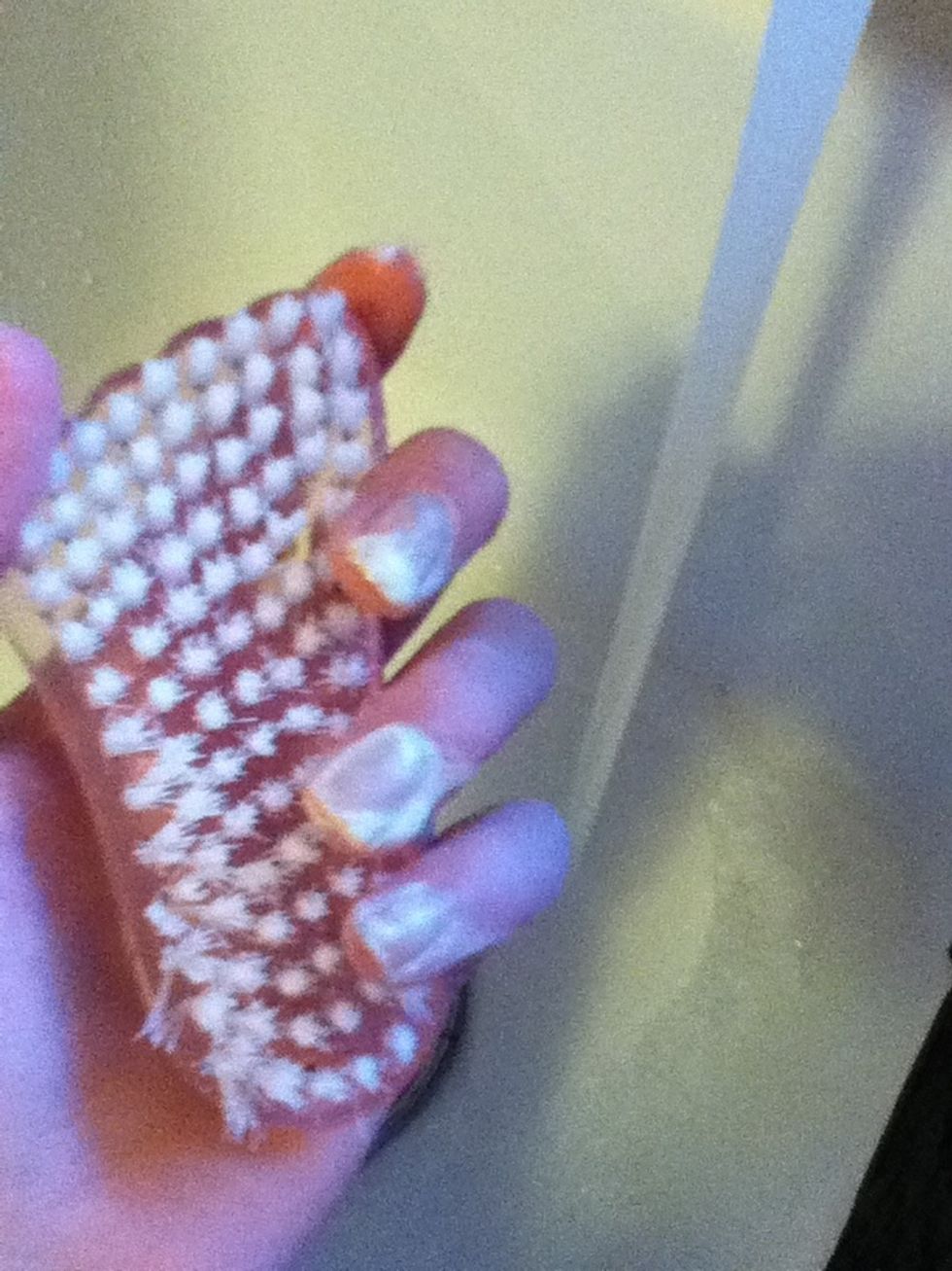 Wash with a scrubber, warm water and soap.