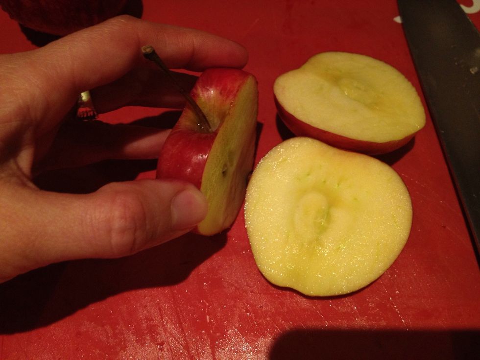 Wash your apples. Leave the skin on and cut around the core.