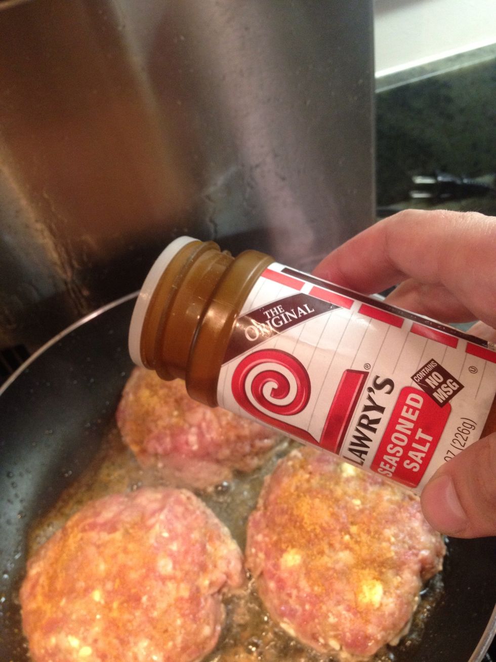 Wash your hands and sprinkle the Lawry's Salt on the patties.