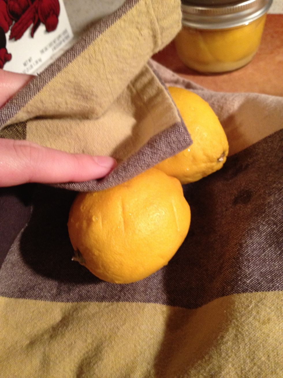 Wash your lemons and dry them completely