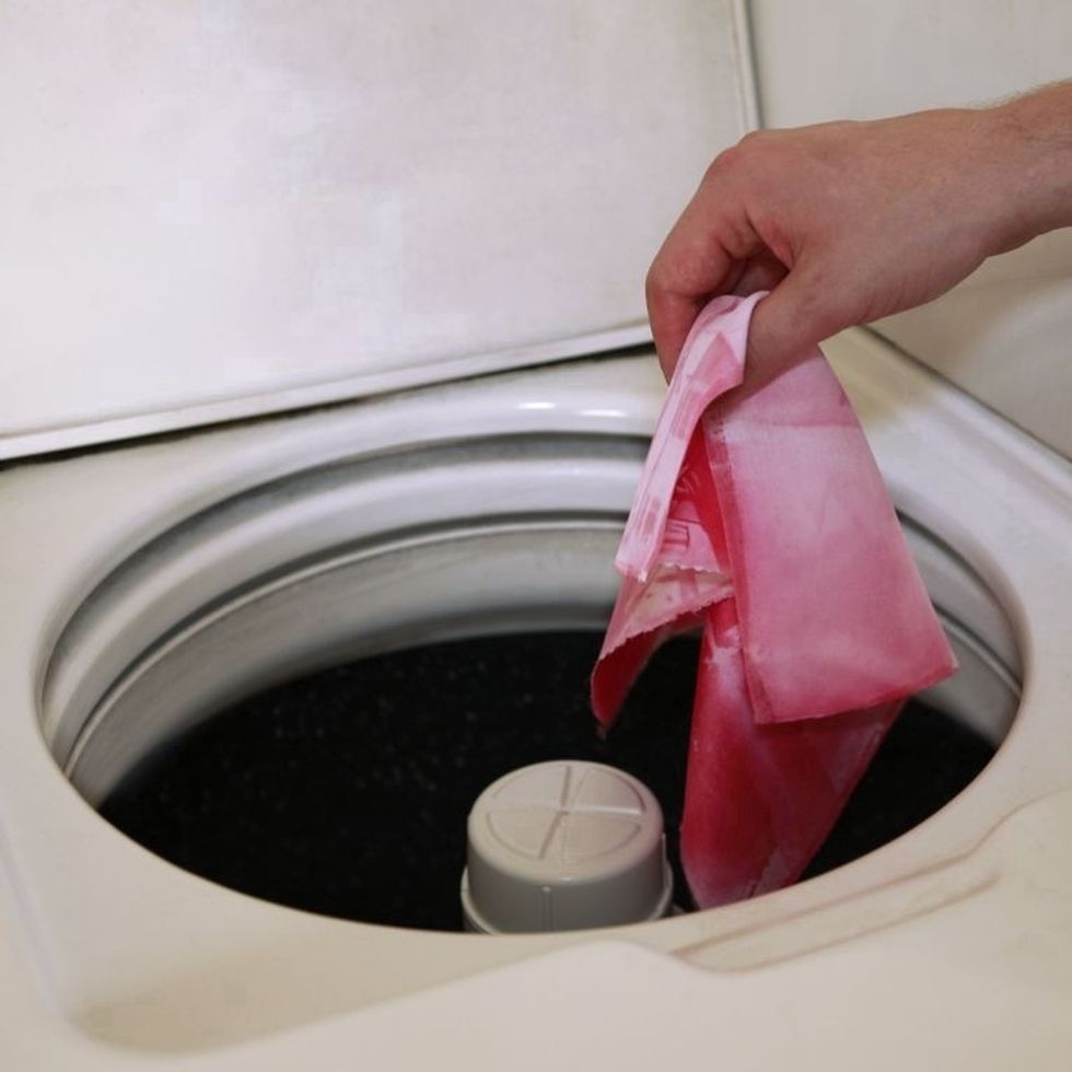 Wash your print with detergent to remove unexposed dye. We recommend washing the print twice in the wash machine on the HOT cycle. If you have hard water, using washing soda or Borax will help.