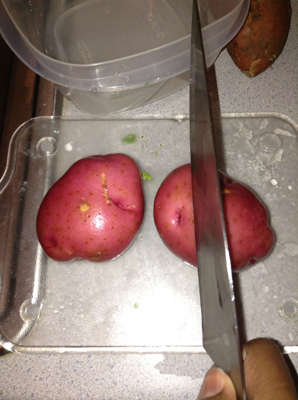 Wash your red potatoes carefully. You don't need to peel them as they can be cooked with the skin on ... Just chop them into little pieces for easy boiling