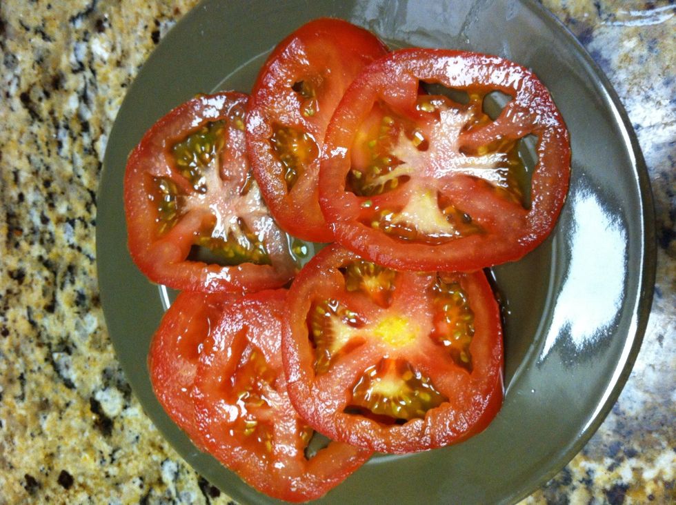 Wash your tomato (hand, not machine) and slice while bread is toasting. Tip: I find slicing tomatoes much easier w/ steak knives. Otherwise I often end up juicing rather than slicing