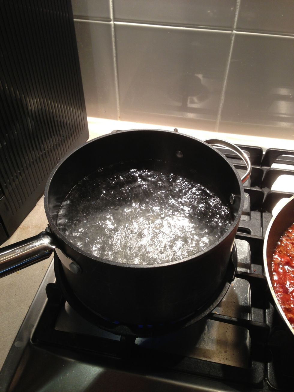 Water should be boiling in sausepan