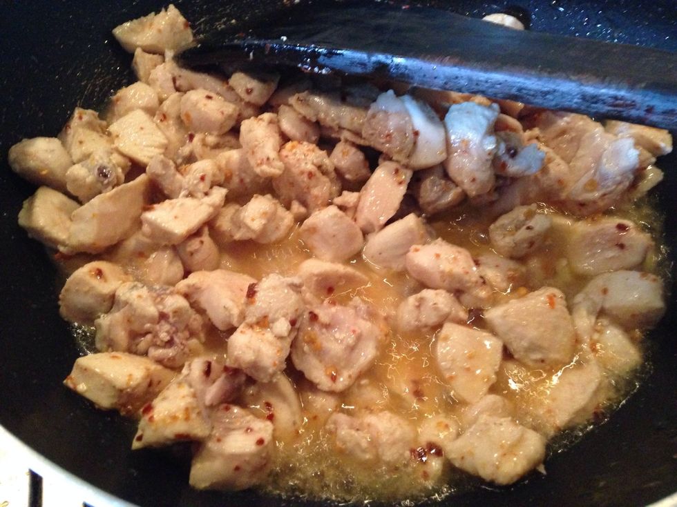 water will be released by chicken let it reduce to minimum.. but don't overcook chicken this stage, just cook it slightly as it is going to be cooked with onions