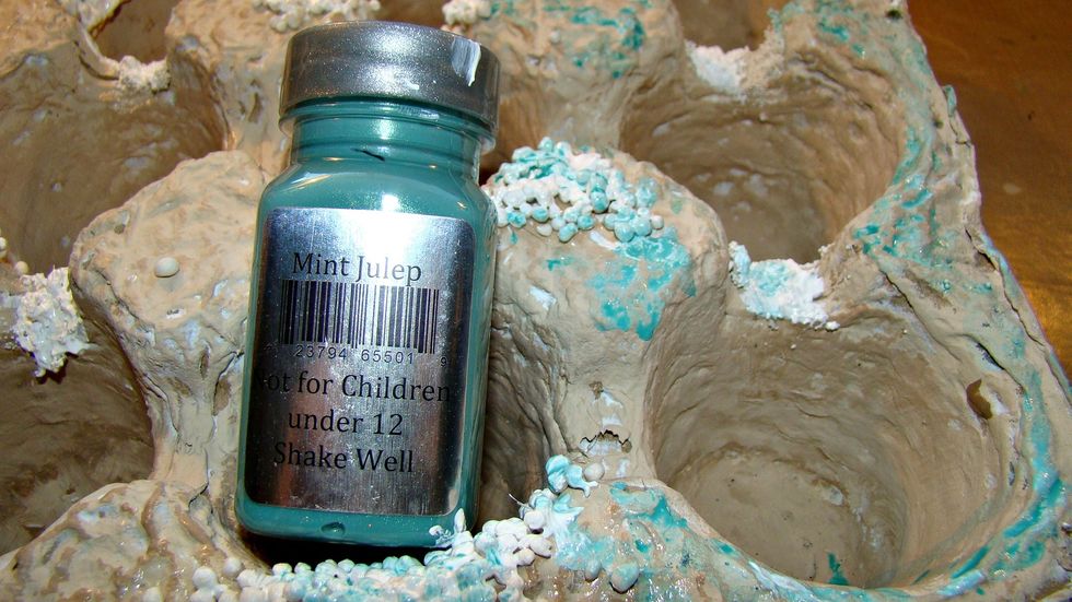 Watered down Mint Julep was splashed here and there on the crate.