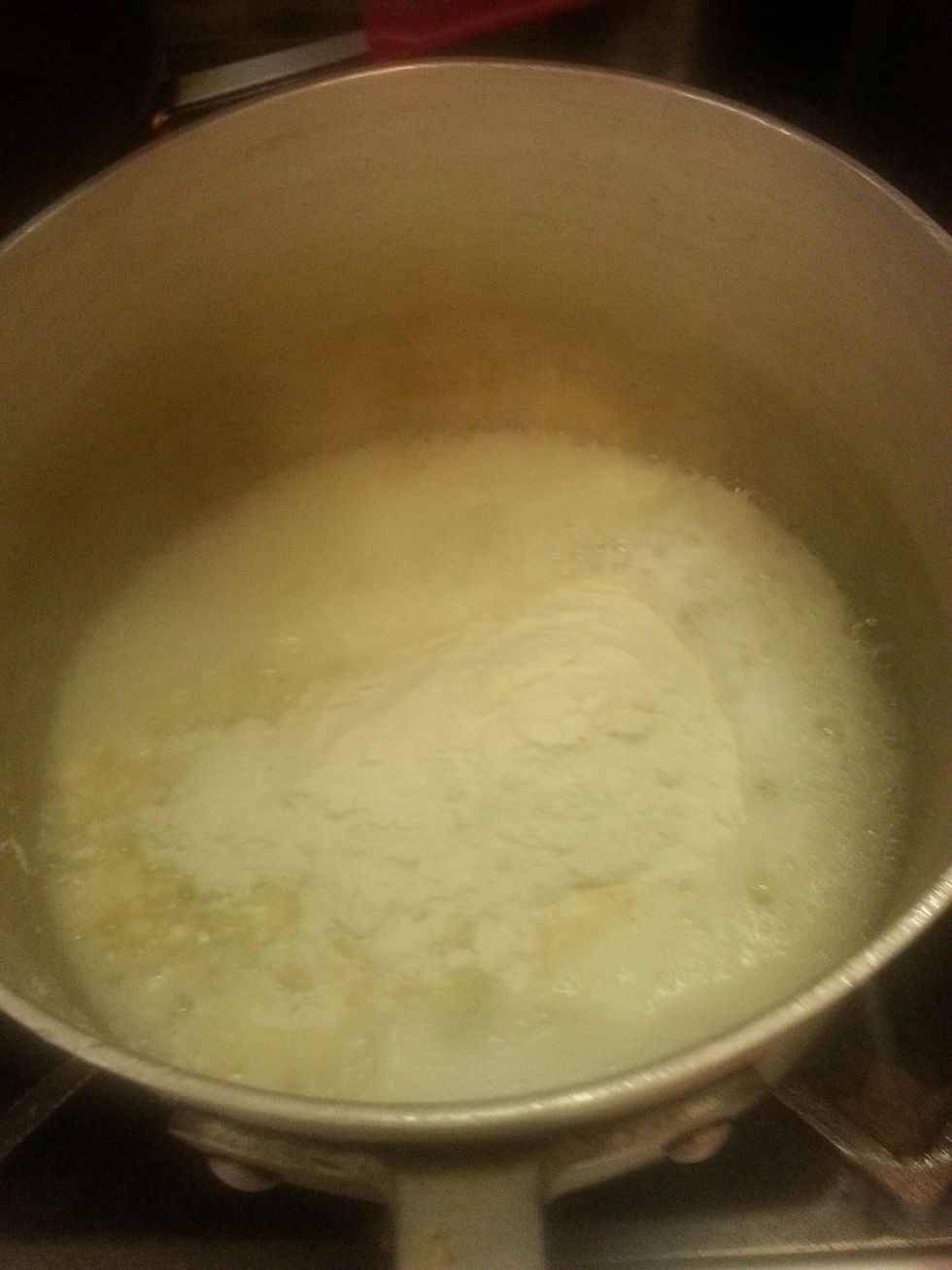 We add the flour and mix with a spoon and remove from the stove (note: use a wooden spoon if you use a metal be careful the heat will heat up the spoon really fast)
