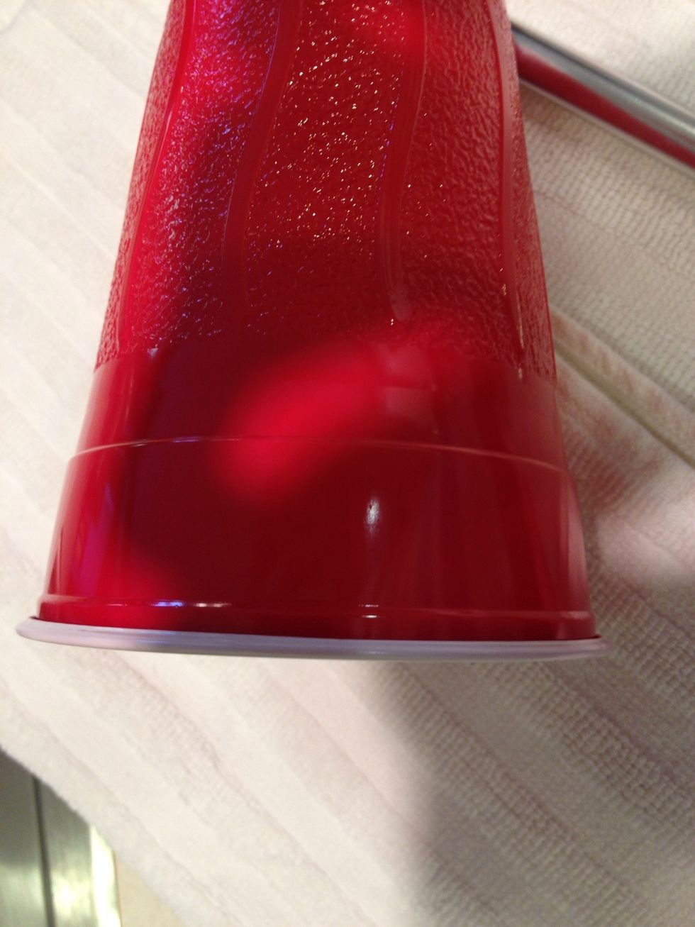 We are going to cut out the top of the lid, where the first line is at.