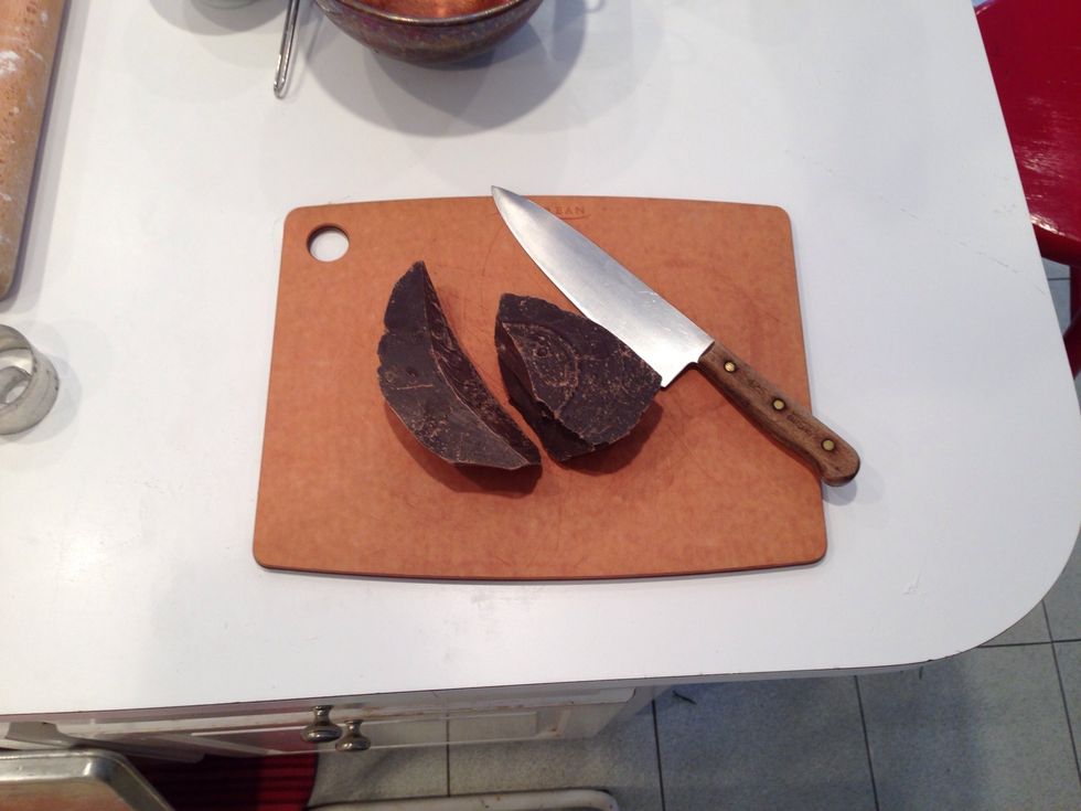 We are going to need melted chocolate later so we'll get it started. Normally , I see big knife and eight year old boys and think Fun! Not this time. Somebody's got to chop this up who isn't you.